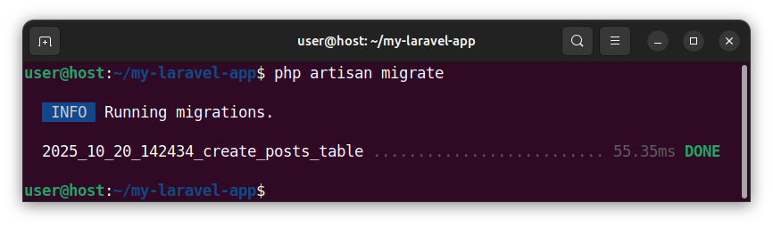 Running a Laravel migration using the artisan command-line tool.